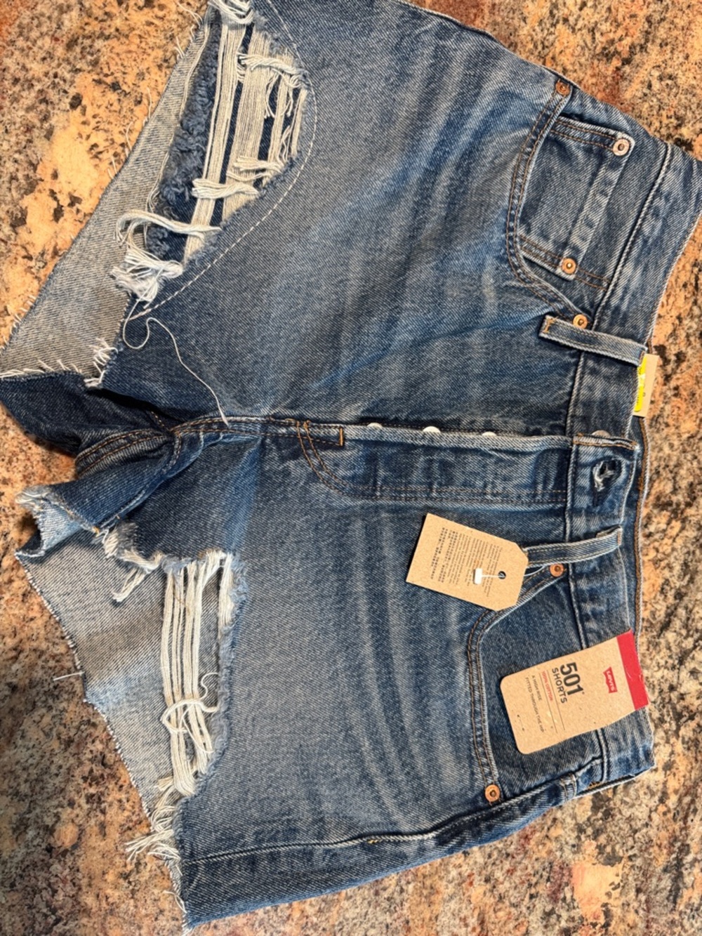 Levi's Distressed Denim Cutoff Shorts - Medium Blue